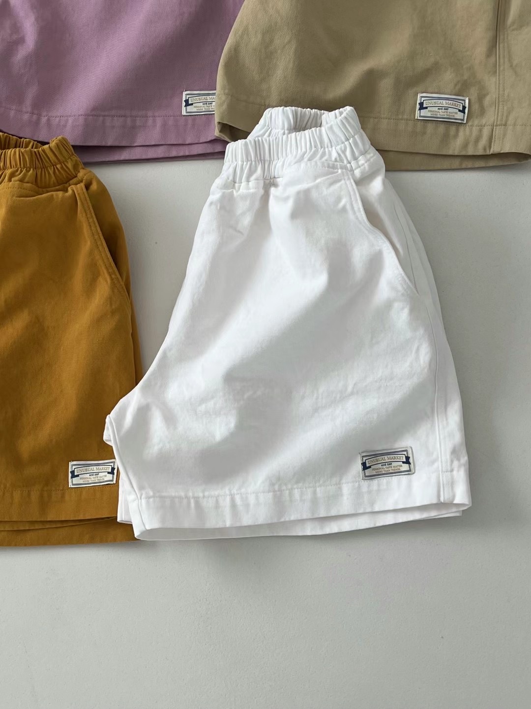 UNUSUALMARKET東大門實拍女裝新品熱賣時尚職業真品休閑短褲UNUSUALMARKET短褲