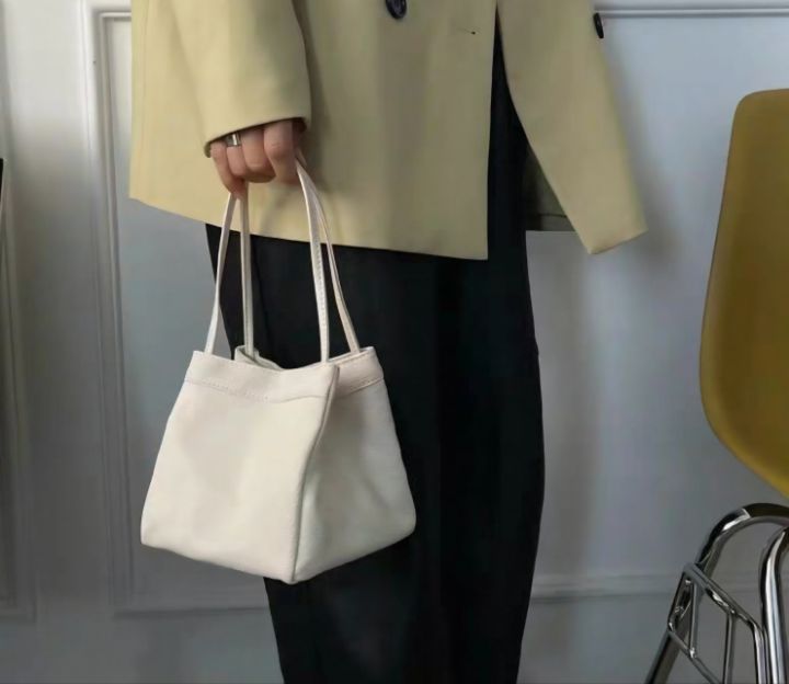 TROUVAILLE韓國代購㊣女士新款休閑時尚推薦手拿包腋下包牛皮TROUVAILLE手拿包/腋下包