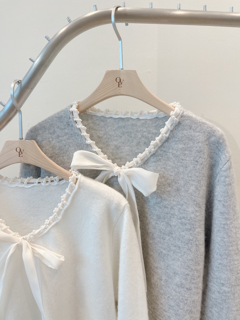 OVE東大門㊣實拍女裝新款熱賣推薦真品人氣職業休閑針織衫蕾絲OVE針織衫