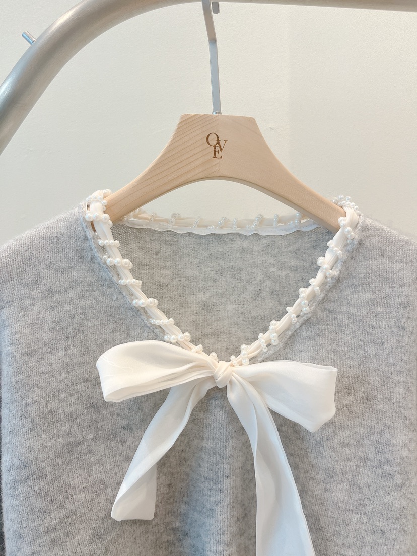 OVE東大門㊣實拍女裝新款熱賣推薦真品人氣職業休閑針織衫蕾絲OVE針織衫