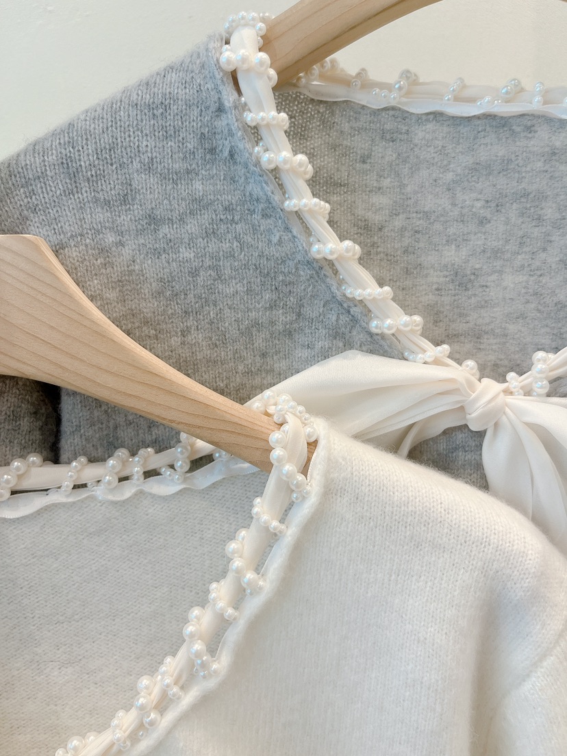 OVE東大門㊣實拍女裝新款熱賣推薦真品人氣職業休閑針織衫蕾絲OVE針織衫