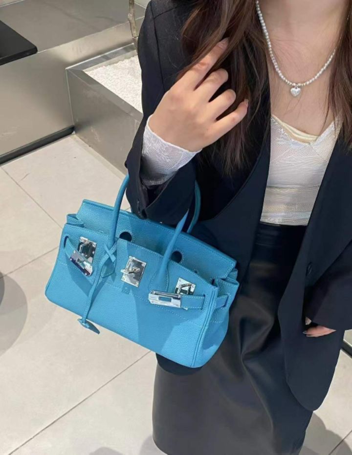 TROUVAILLE東大門直郵女裝新款職業推薦手拿包腋下包牛皮TROUVAILLE手拿包/腋下包