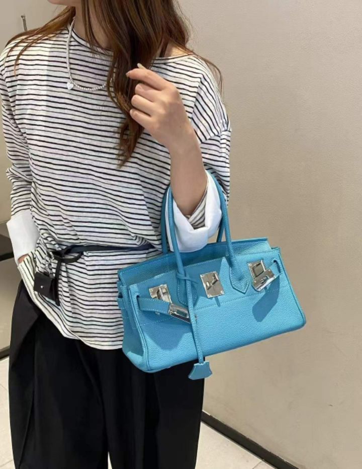 TROUVAILLE東大門直郵女裝新款職業推薦手拿包腋下包牛皮TROUVAILLE手拿包/腋下包