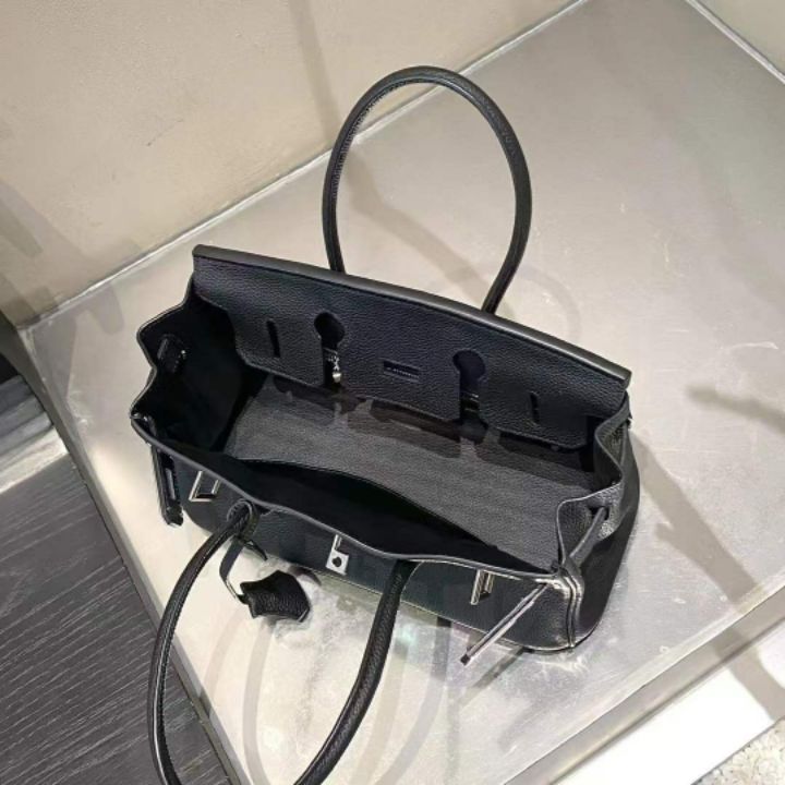 TROUVAILLE東大門直郵女裝新款職業推薦手拿包腋下包牛皮TROUVAILLE手拿包/腋下包