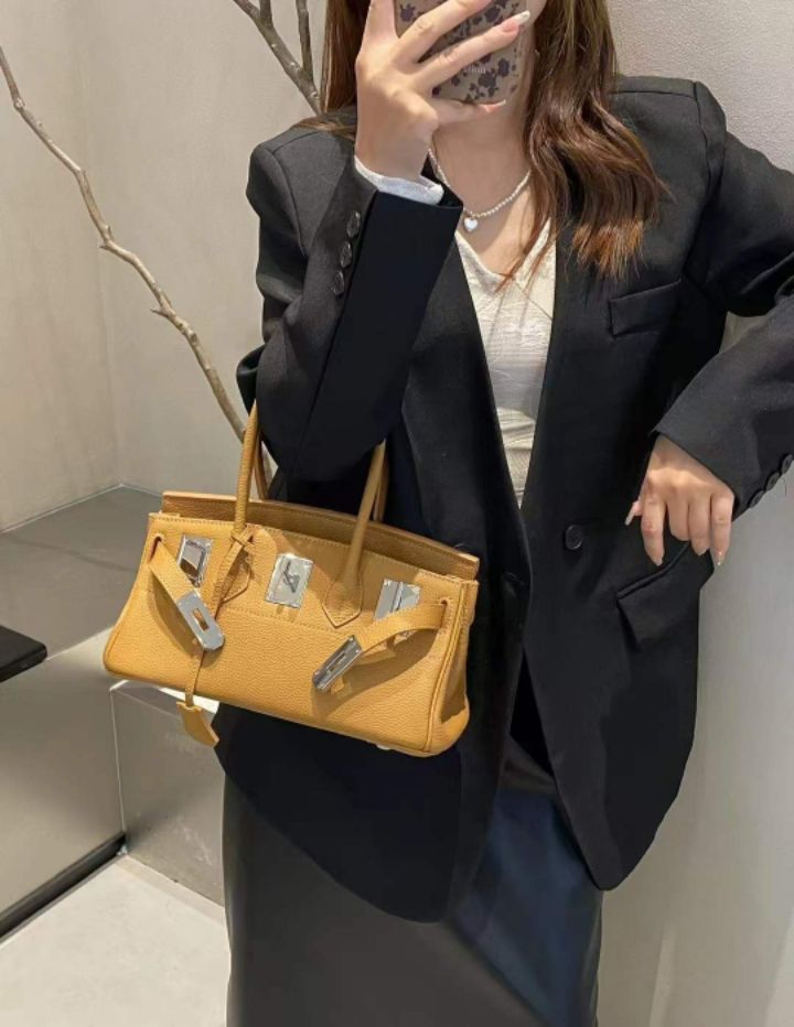 TROUVAILLE東大門直郵女裝新款職業推薦手拿包腋下包牛皮TROUVAILLE手拿包/腋下包