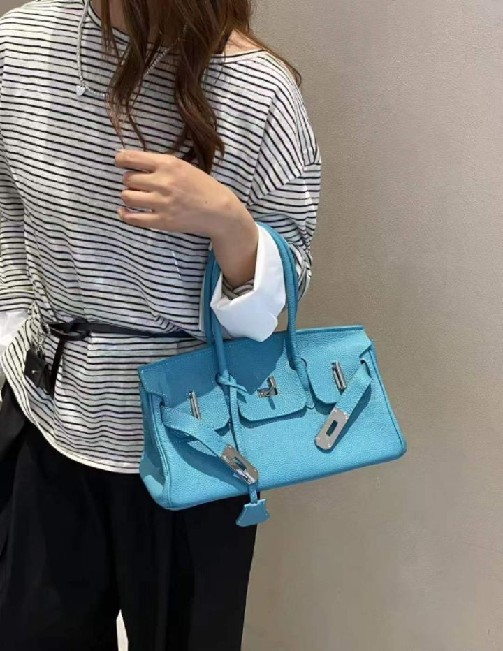 TROUVAILLE東大門直郵女裝新款職業推薦手拿包腋下包牛皮TROUVAILLE手拿包/腋下包