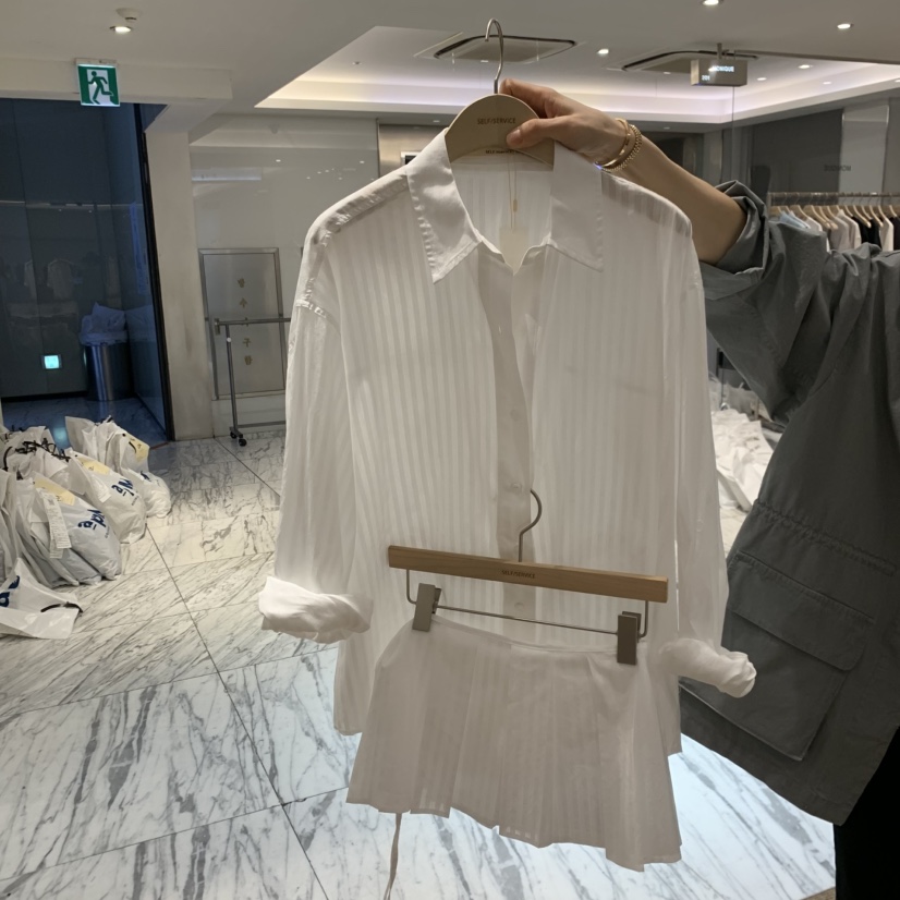 SELF SERVICE韓國直郵實拍女士新款推薦熱賣休閑短裙透明SELF SERVICE短裙