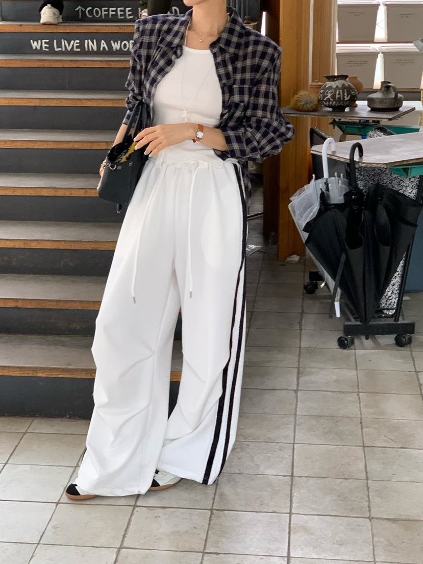 REVE CITE-L韓國東大門直郵女士新款推薦時尚休閑褲流蘇REVE CITE-L休閑褲