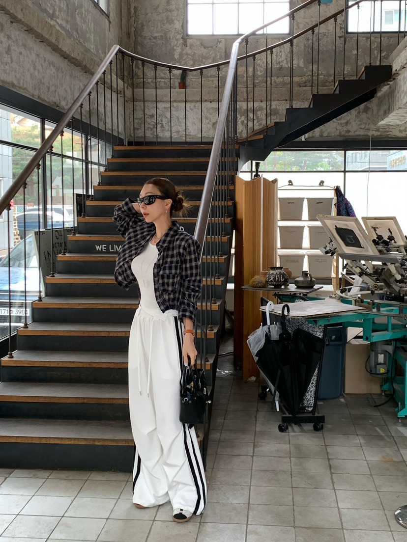 REVE CITE-L韓國東大門直郵女士新款推薦時尚休閑褲流蘇REVE CITE-L休閑褲