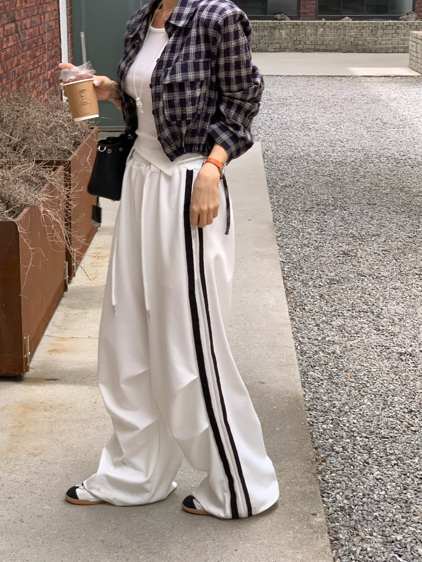 REVE CITE-L韓國東大門直郵女士新款推薦時尚休閑褲流蘇REVE CITE-L休閑褲