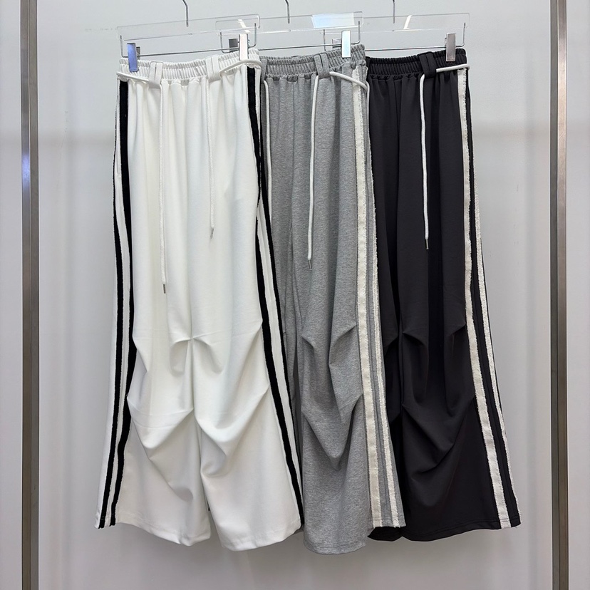 REVE CITE-L韓國東大門直郵女士新款推薦時尚休閑褲流蘇REVE CITE-L休閑褲