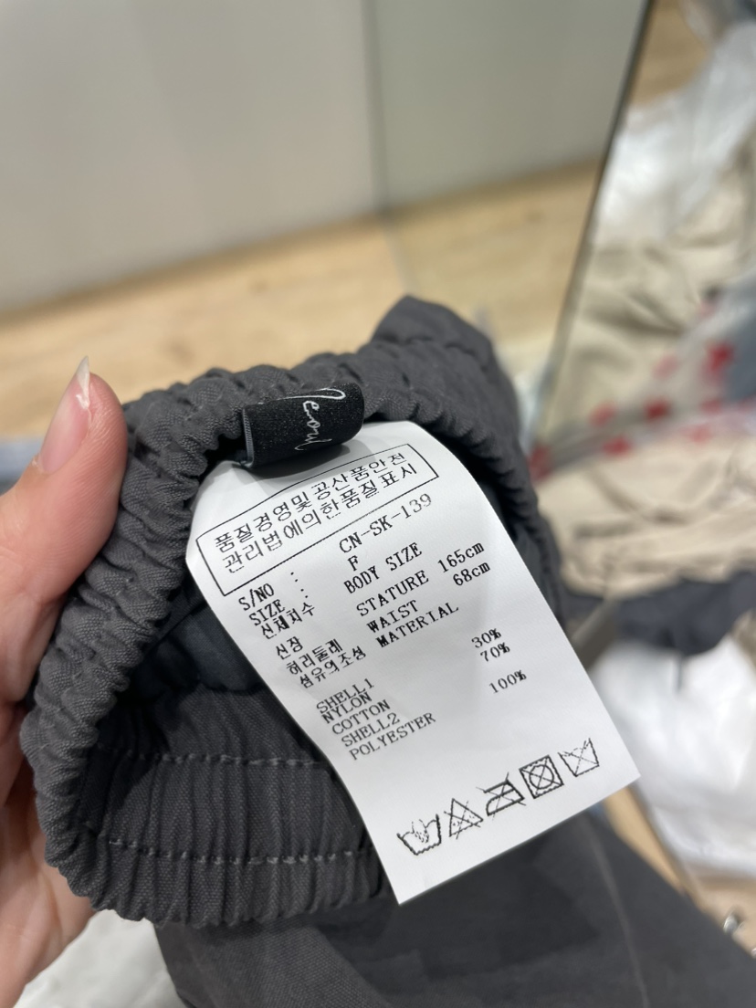 NEOUL東大門實拍韓國女裝新品職業休閑熱賣推薦時尚短裙SNEOUL/ahin雙領標簽短裙