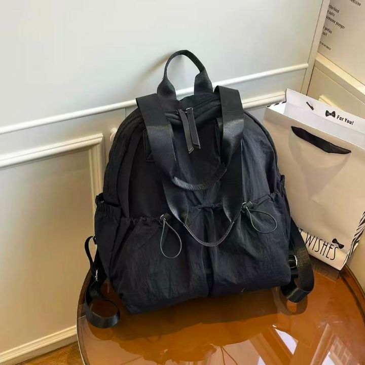 TROUVAILLE東大門代購26秋冬抽繩褶皺中款雙肩包雙肩背包抽繩TROUVAILLE雙肩背包